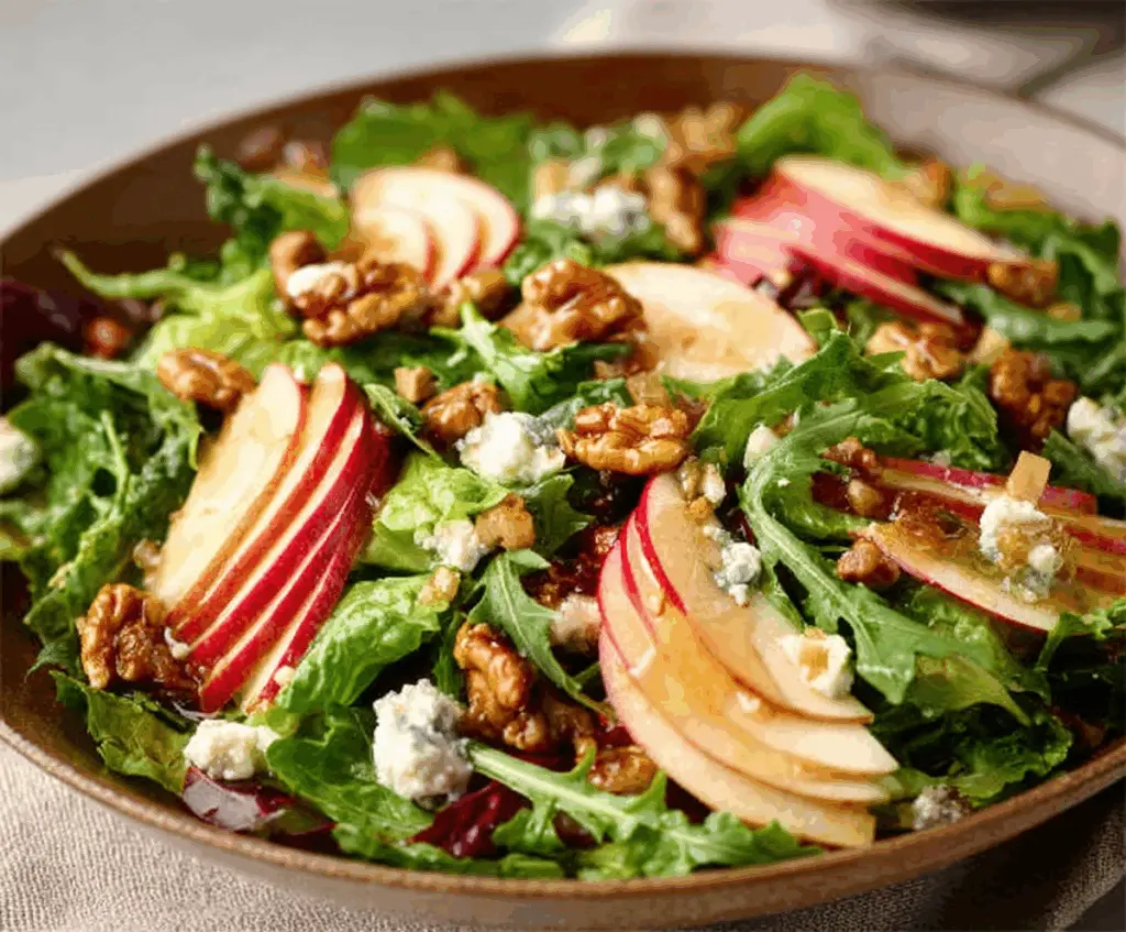 Fresh Honeycrisp Salad with crisp apple slices, mixed greens, and a drizzle of honey for a healthy meal.